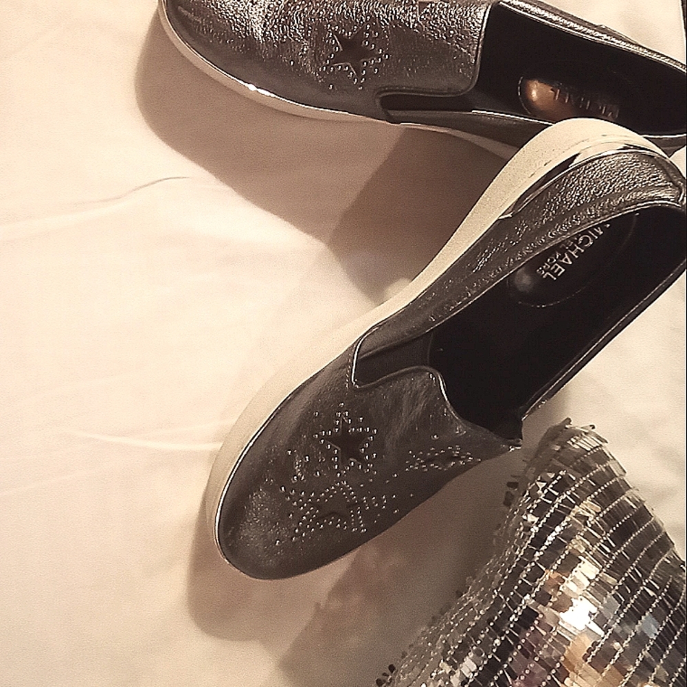 Woman's Michael Kors size 8 1/2 Grey